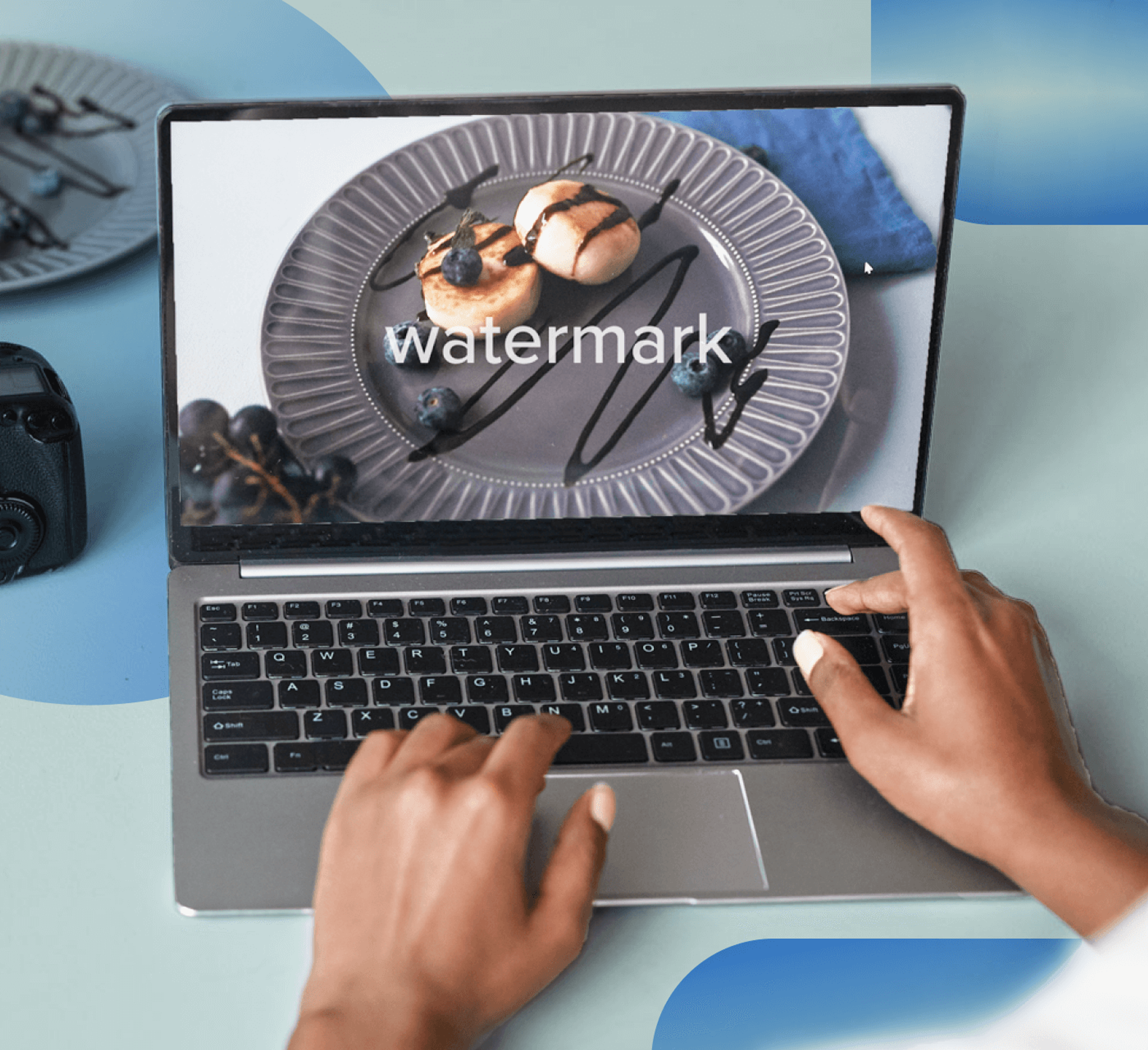 laptop with watermark on screen