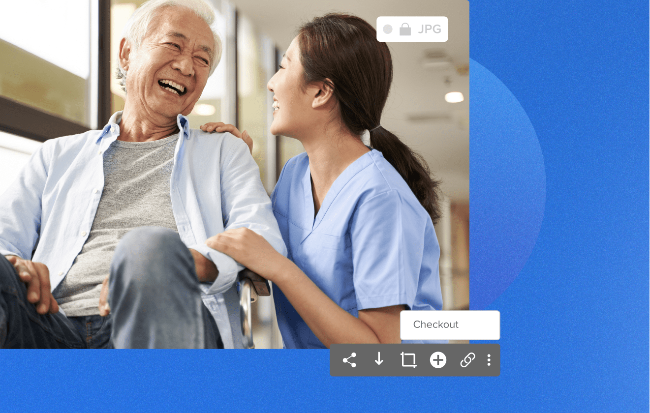 man and woman laughing in doctors office setting