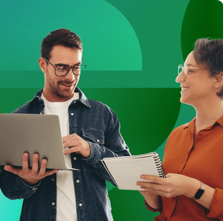 Man in glasses holding a laptop explaining what digital asset management is to a women in glasses holding a notepad with a geometric green background