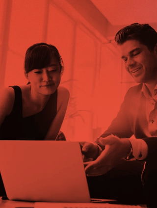 man and woman discussing work