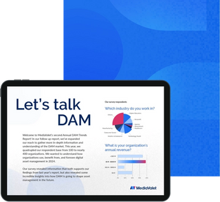 The 2024 digital asset management (DAM) trends report inside page on a tablet with the mediavalet logo on bottom of a faded blue geometric shapes background