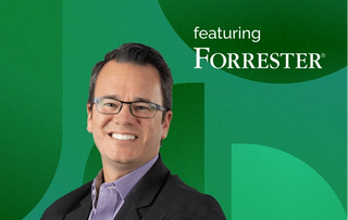 Nick Barber, senior analyst at Forrester, posing in business attire with a faded geometric green background