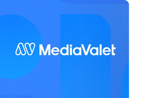 White mediavalet logo on a two-toned blue background with geometric shapes