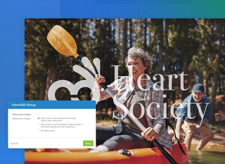 Nonprofit company Heart Society over an image of women kayaking with a man behind her in the forester with a watermark and edit view group options on a blue background