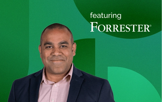 Fernando Pena, a principal analyst from Forrester, posing in business attire with a faded geometric green background