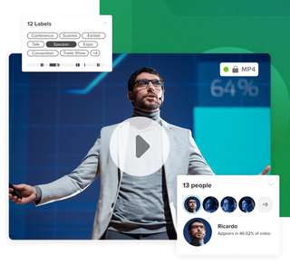 Screenshot of a video in a MediaValet library to showcase Video Digital Asset Management capabilities. Video file with man speaking on a blue and green background
