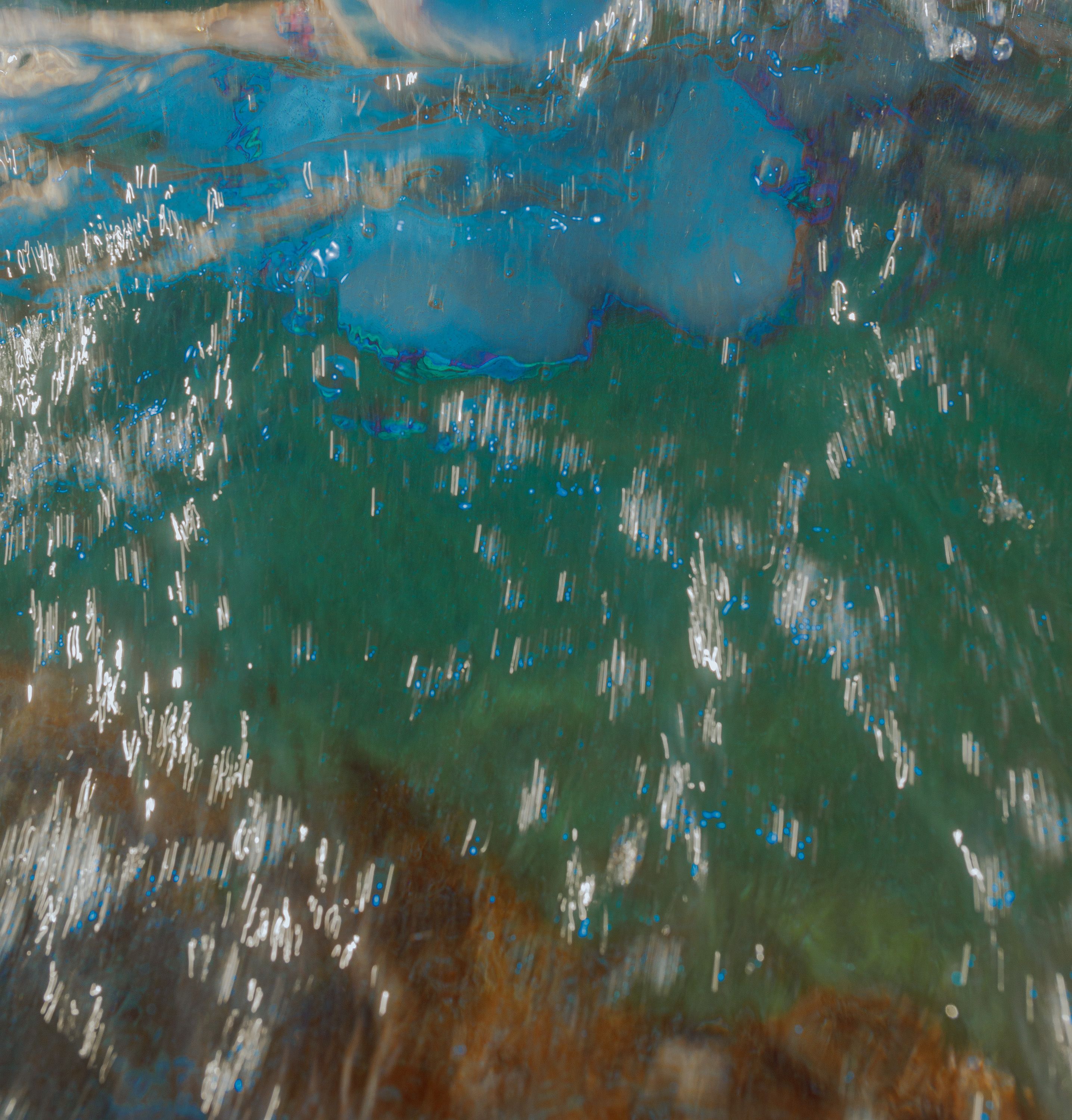 blue specks in a blue ocean