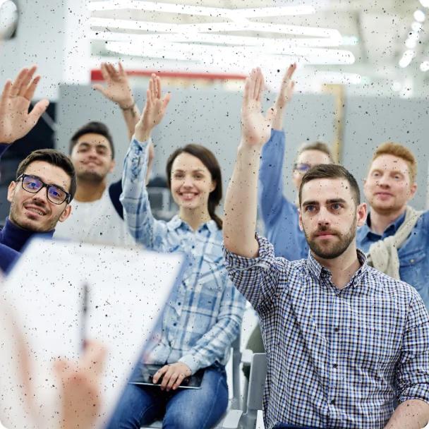 Colleagues raising hands