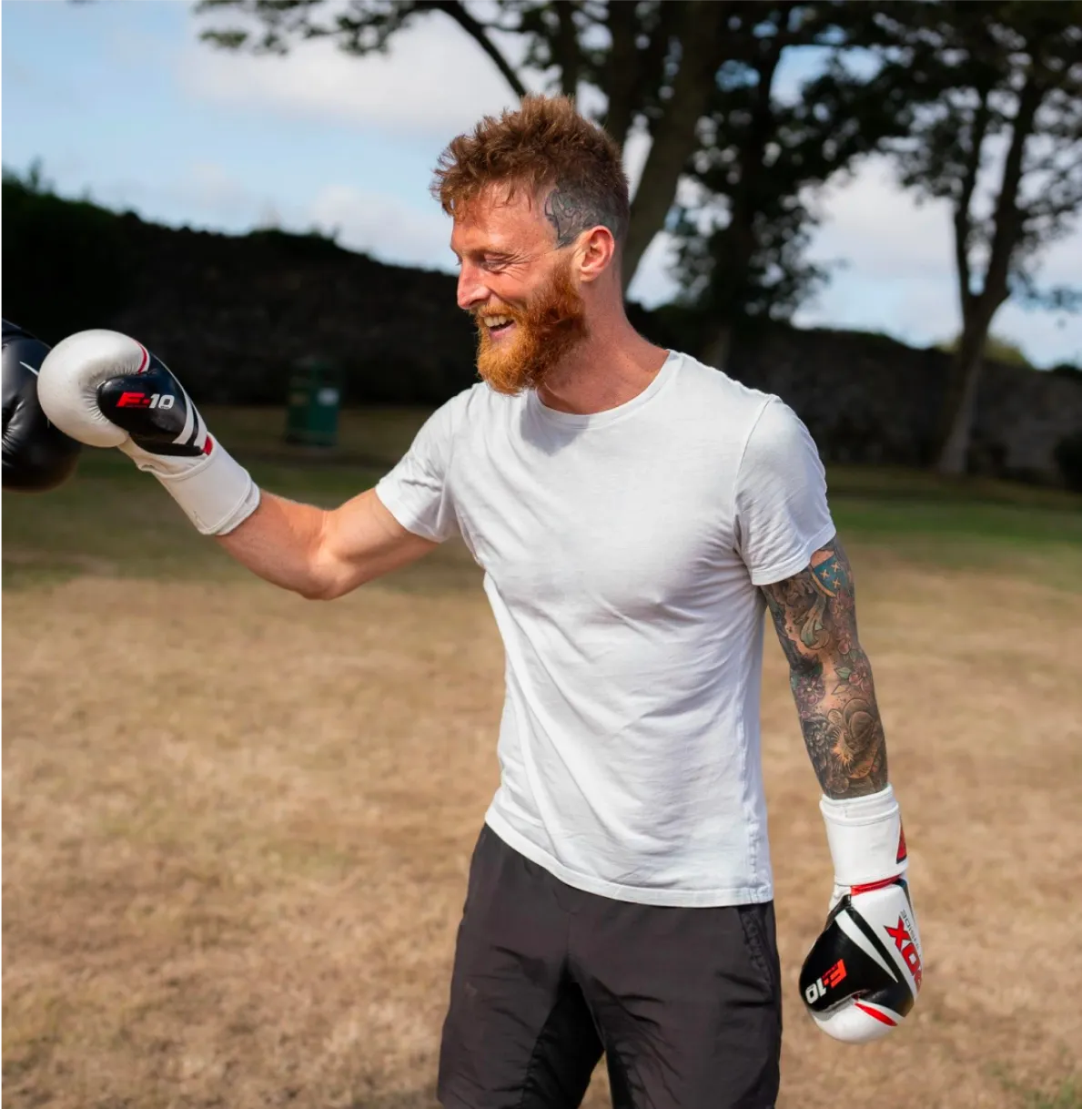 Liam taking part in boxing activity