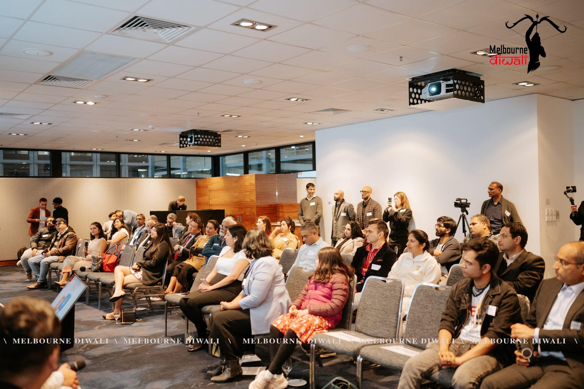 The Launch room at RACV City Club from the back, guests seated in rows facing the screens