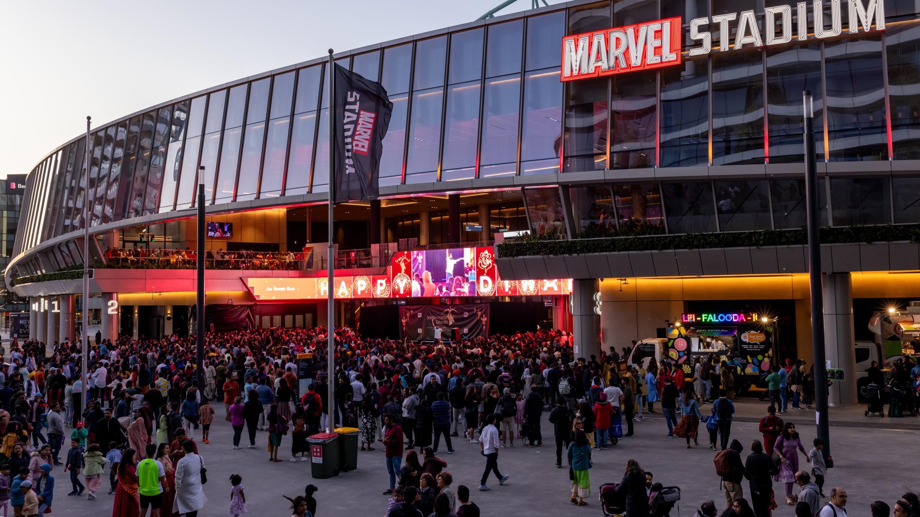 Crowds outside Marvel Stadium at dusk during Melbourne Diwali