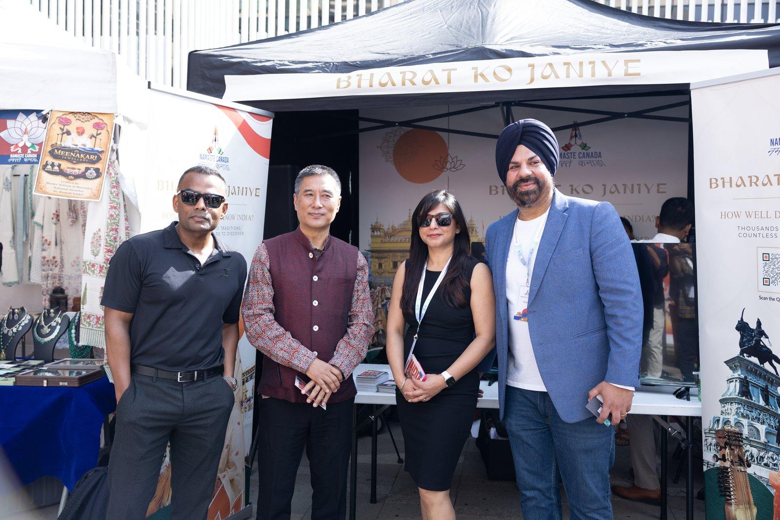 The Bharat Ko Janiye team at their stall in Vancouver