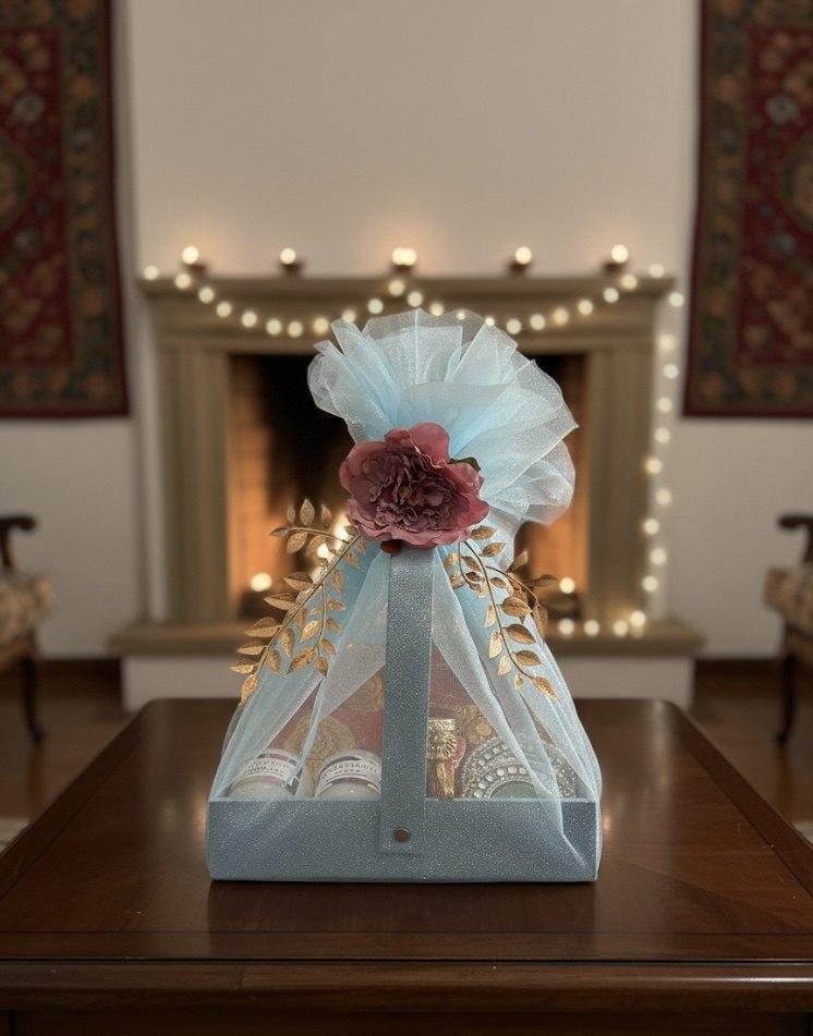Diwali gift hamper wrapped with a bow, from Aaria's Creations