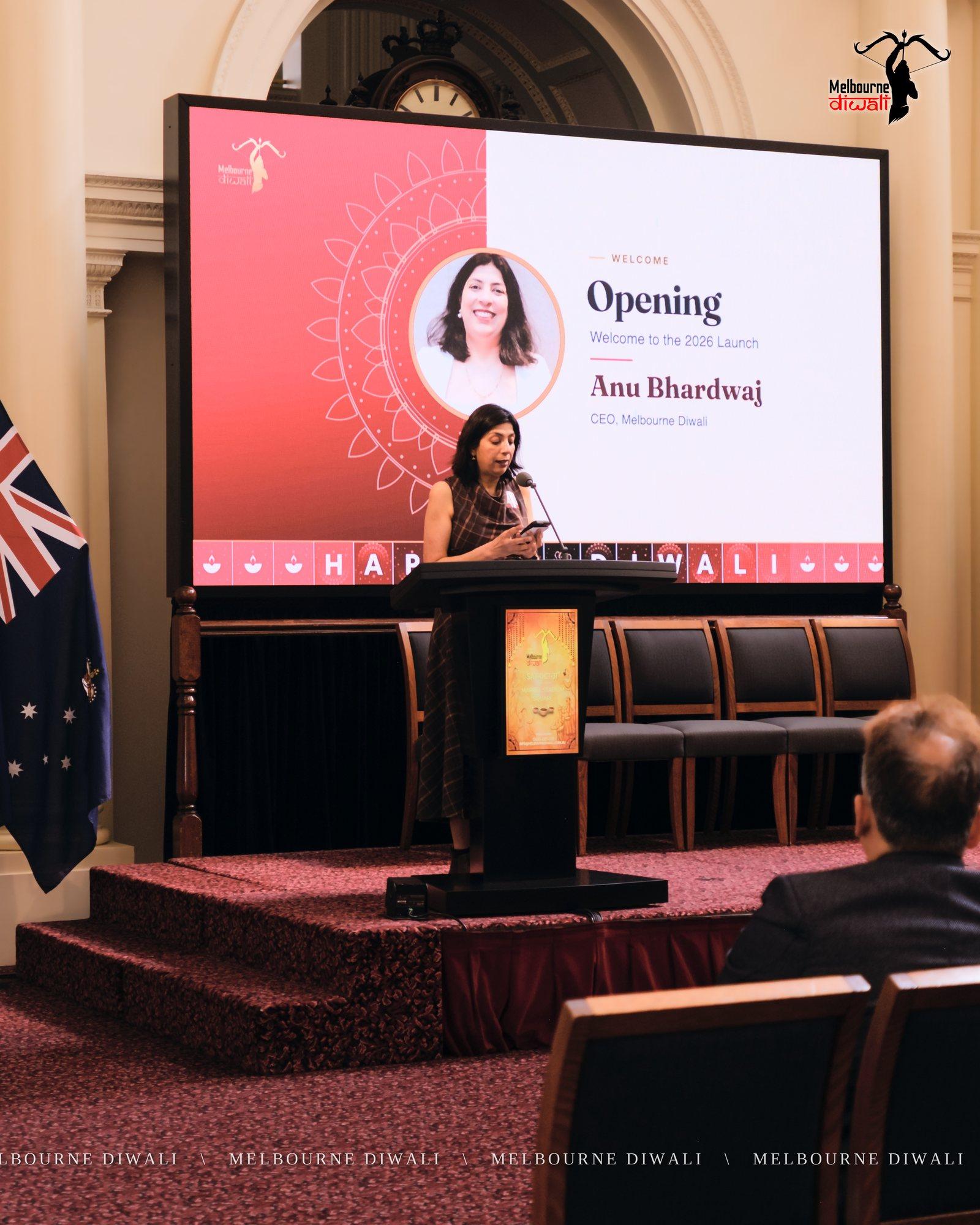 Anu Bhardwaj, CEO of Melbourne Diwali, opens the Launch beside her name slide