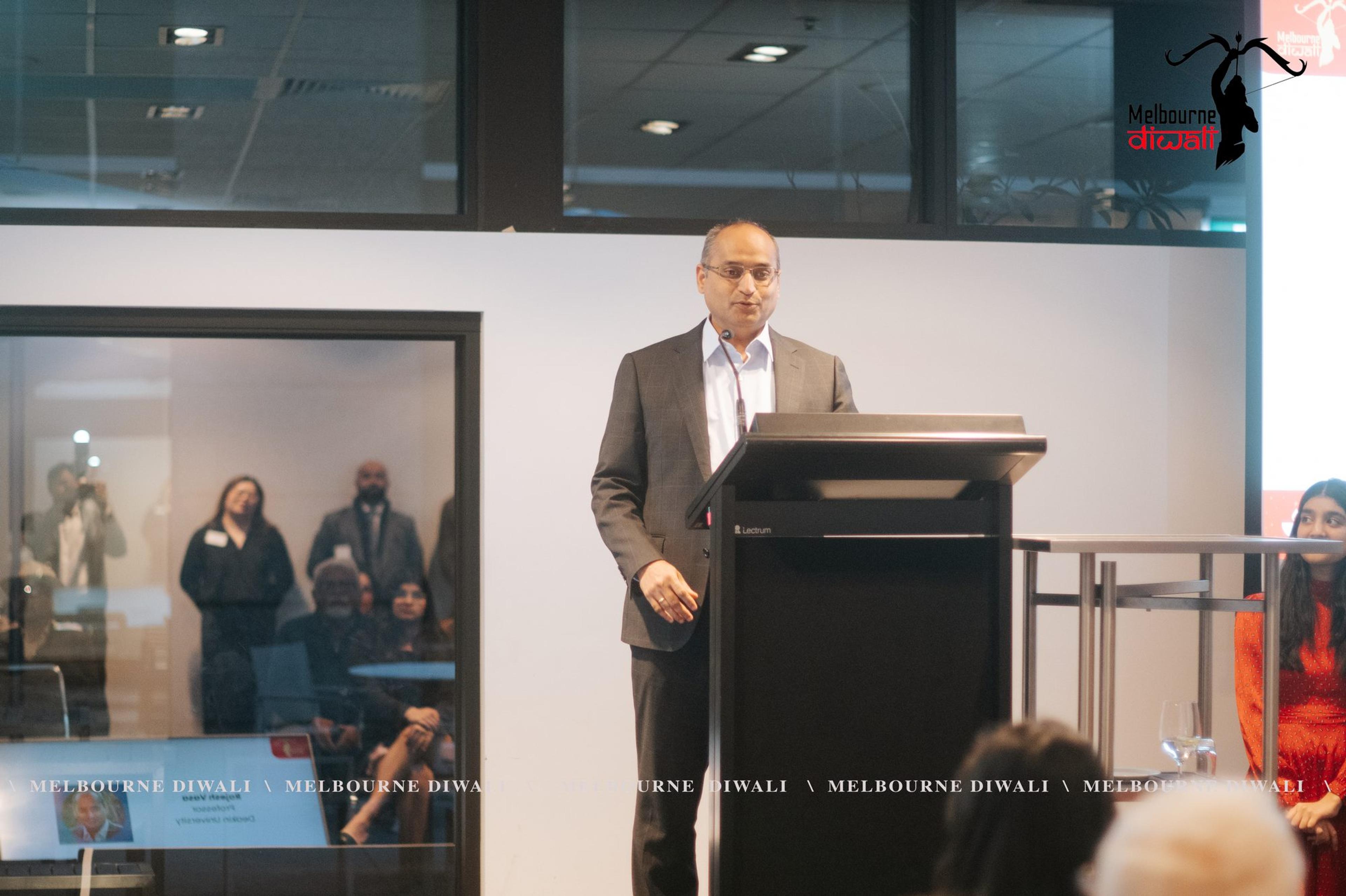 Professor Rajesh Vasa of Deakin University gives the closing note at the lectern