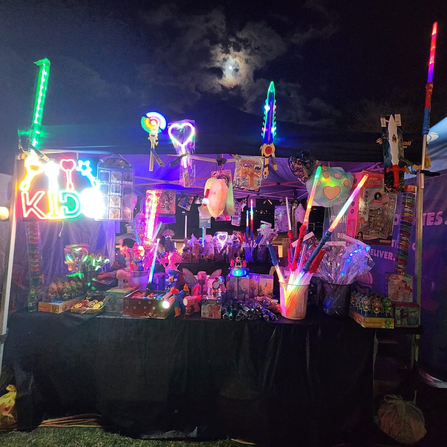 Kids Glow stall with glowing wands and toys