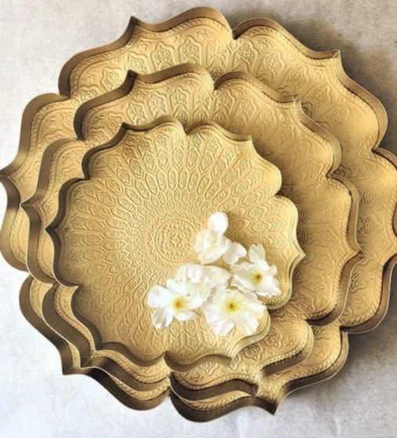 Gold lotus urlis with flowers