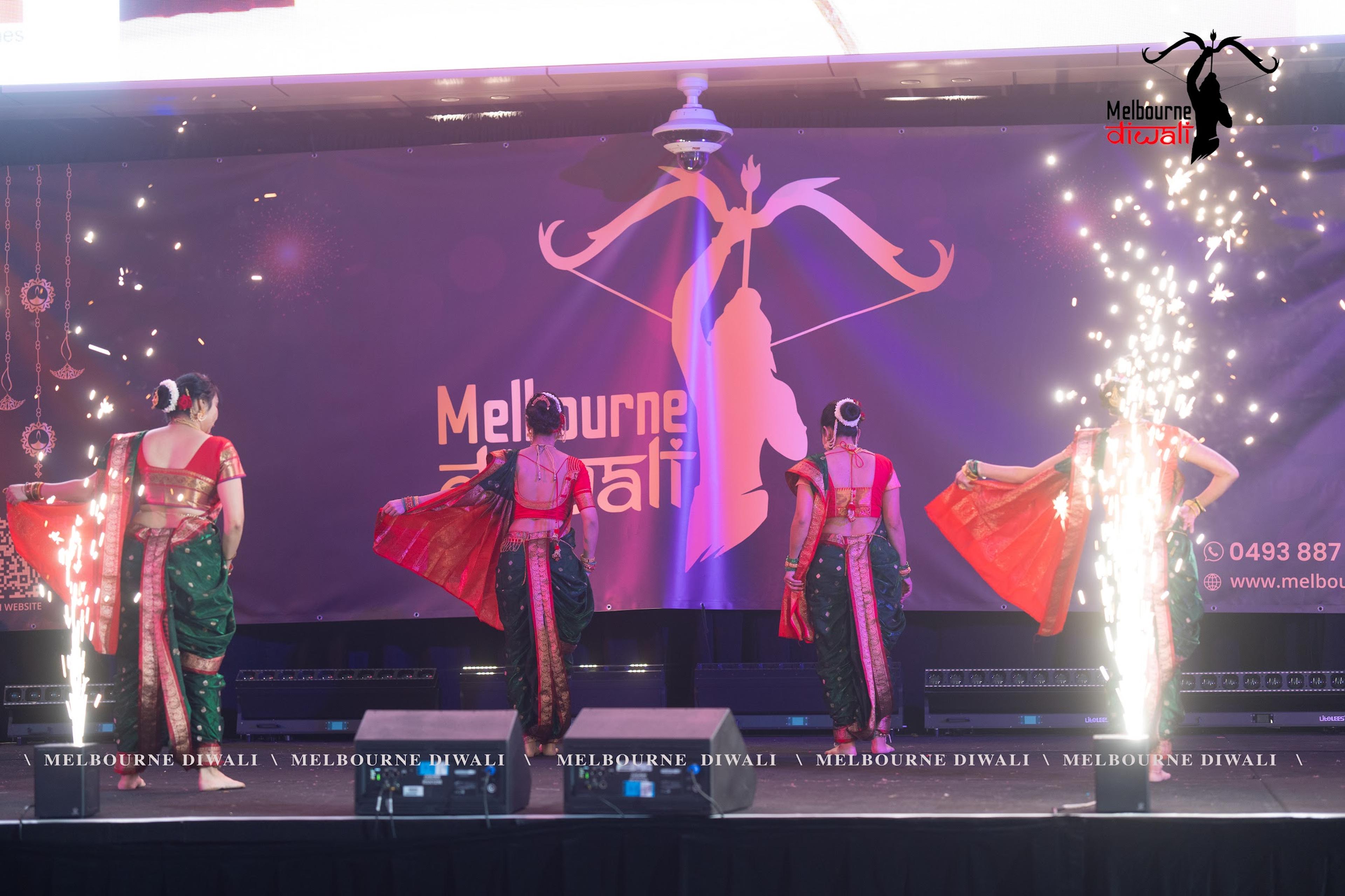 Stage pyrotechnics light up a dance performance at Melbourne Diwali 2025