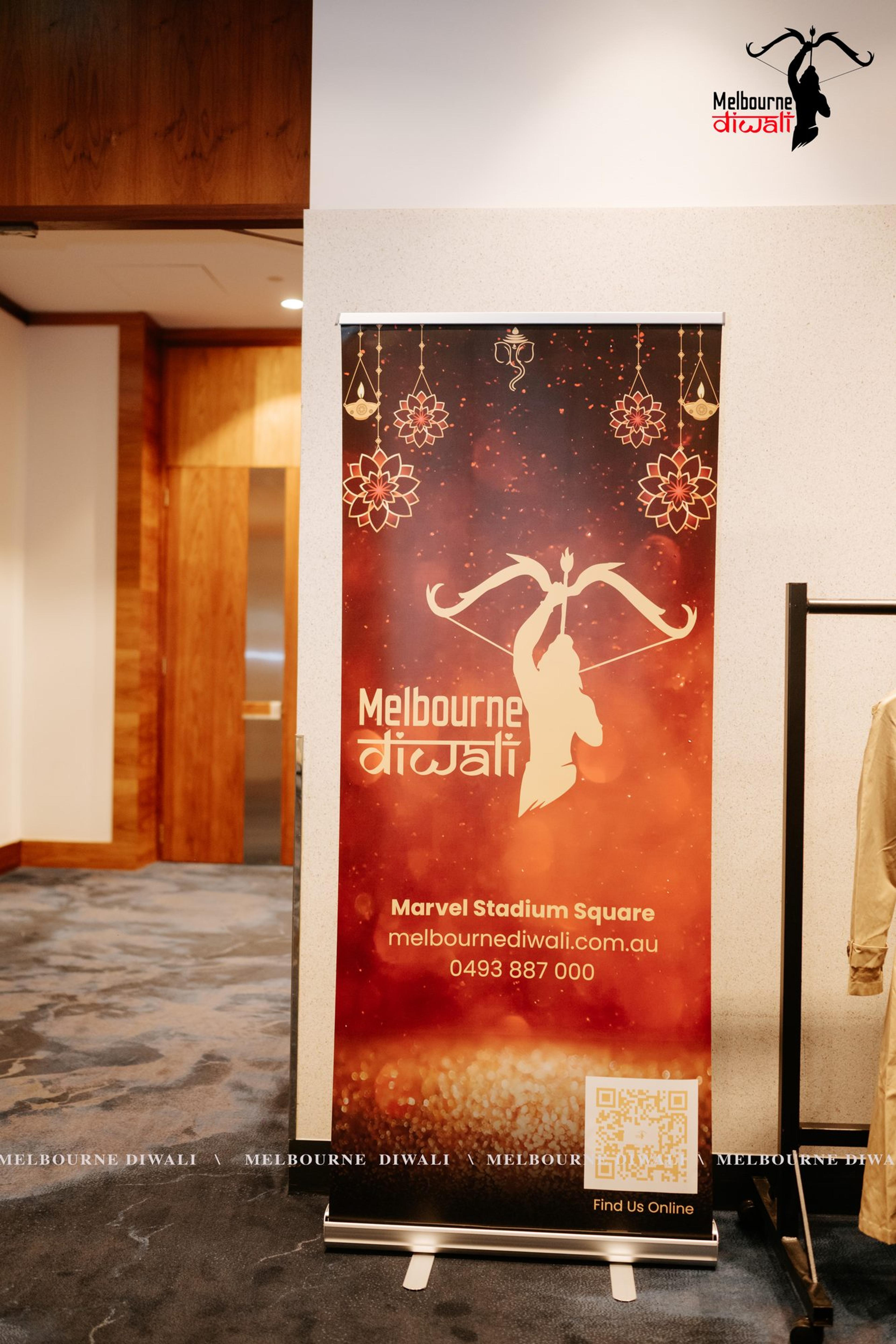A Melbourne Diwali pull-up banner with the Marvel Stadium Square festival details at the entrance to the Launch room