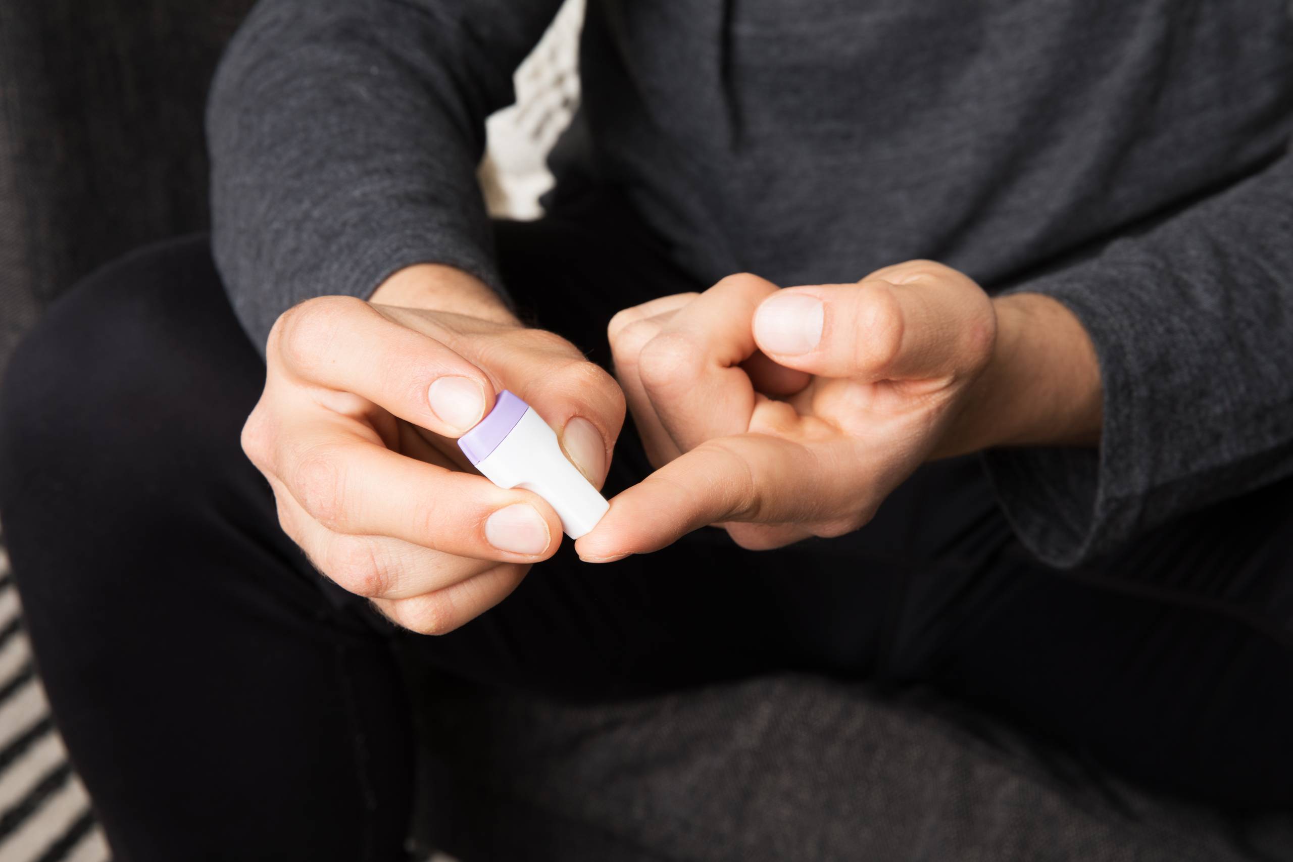image of user using the rootine blood test finger prick