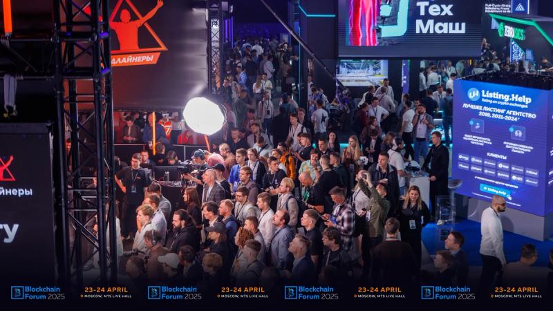 Zoomed-in view of people at a convention.