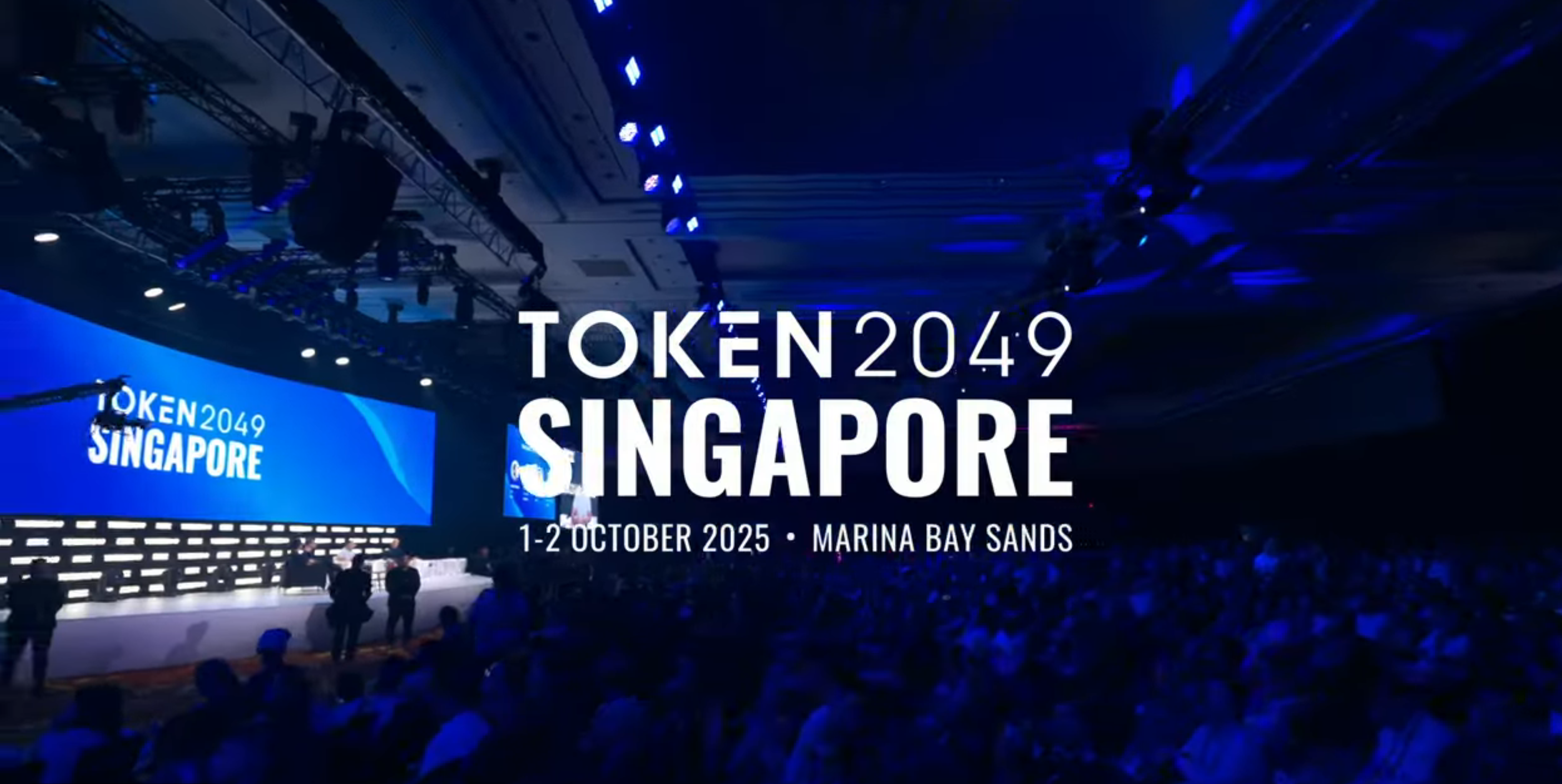 Token2049 Singapore conference at Marina Bay Sands, where blockchain projects and industry participants gathered during the October 2025 event referenced in the BlockDAG discussion.