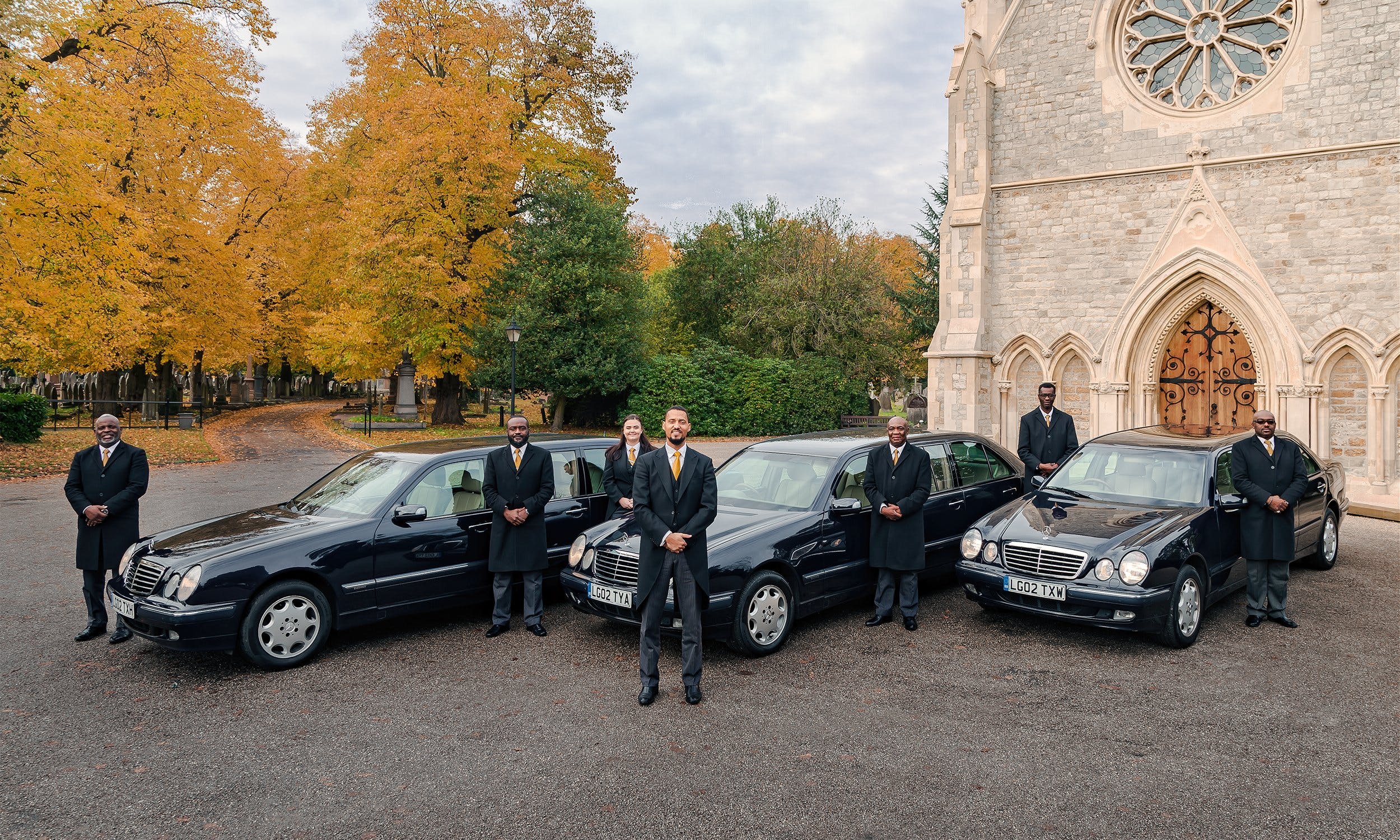 Hearse and Limousine with Pall Bearers
