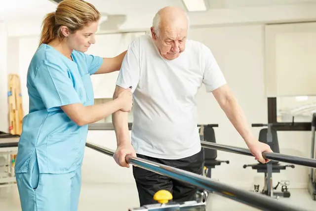 Nurse helping an elderly man with his ability to walk using bars.