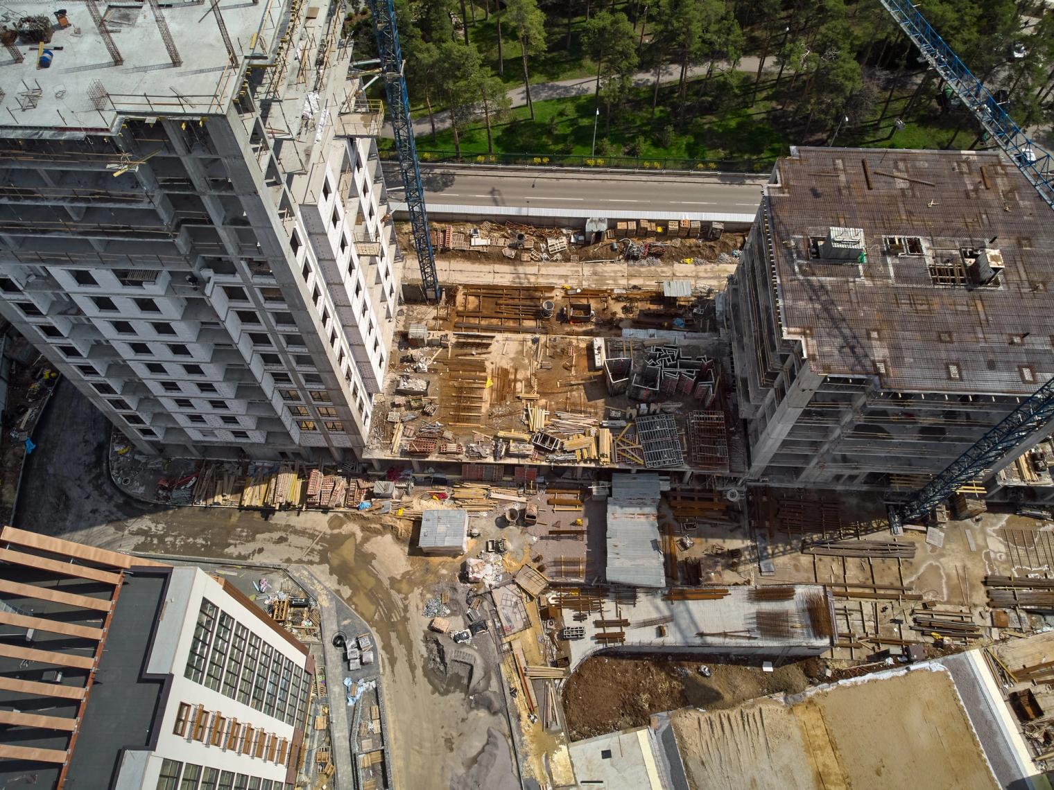busy-construction-site-and-construction-equipment-2022-12-16-14-54-25-utc