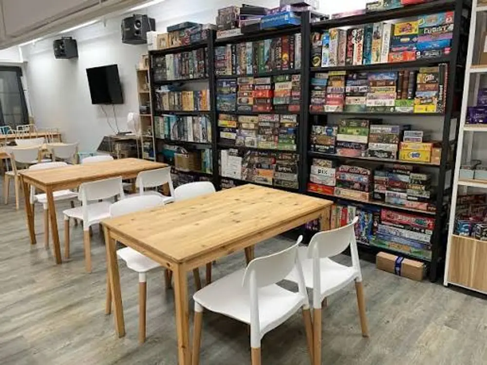 board game cafe friends playing tabletop games Hong Kong
