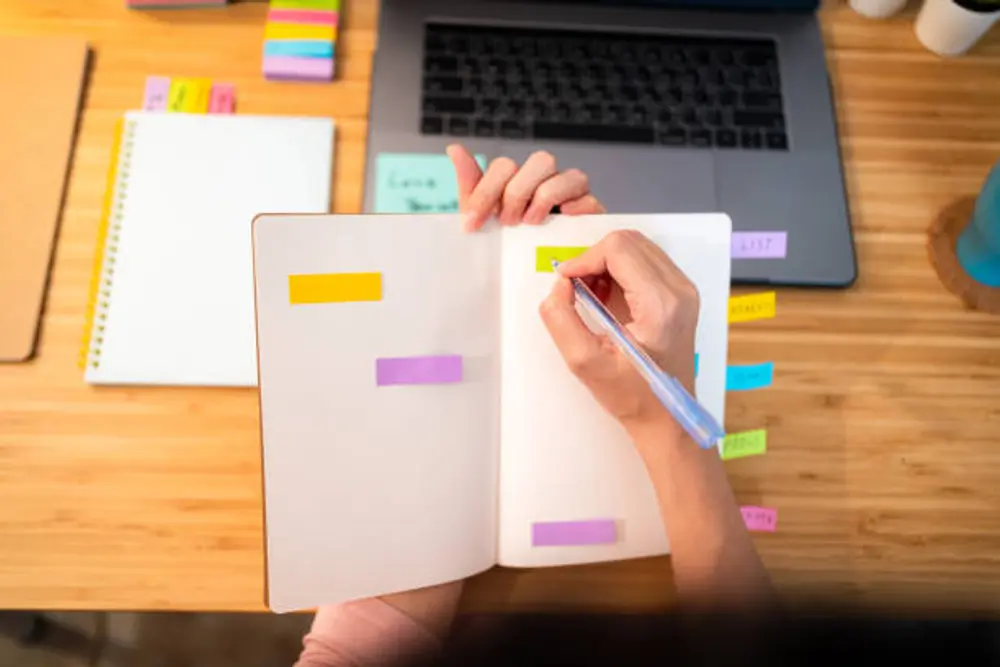 student writing assignment laptop deadline calendar planning