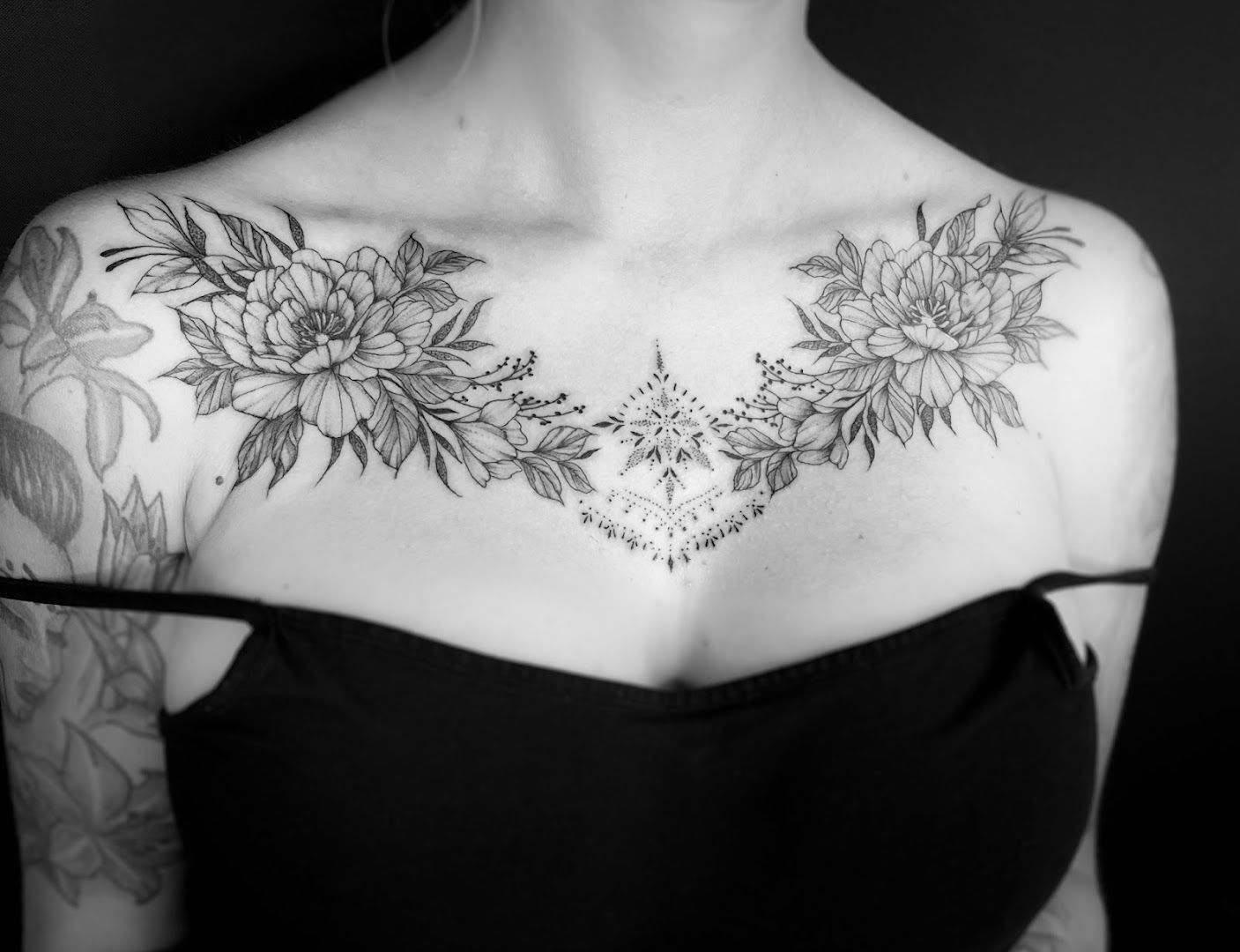 a woman with a cover-up tattoo on her chest, saarlouis, germany