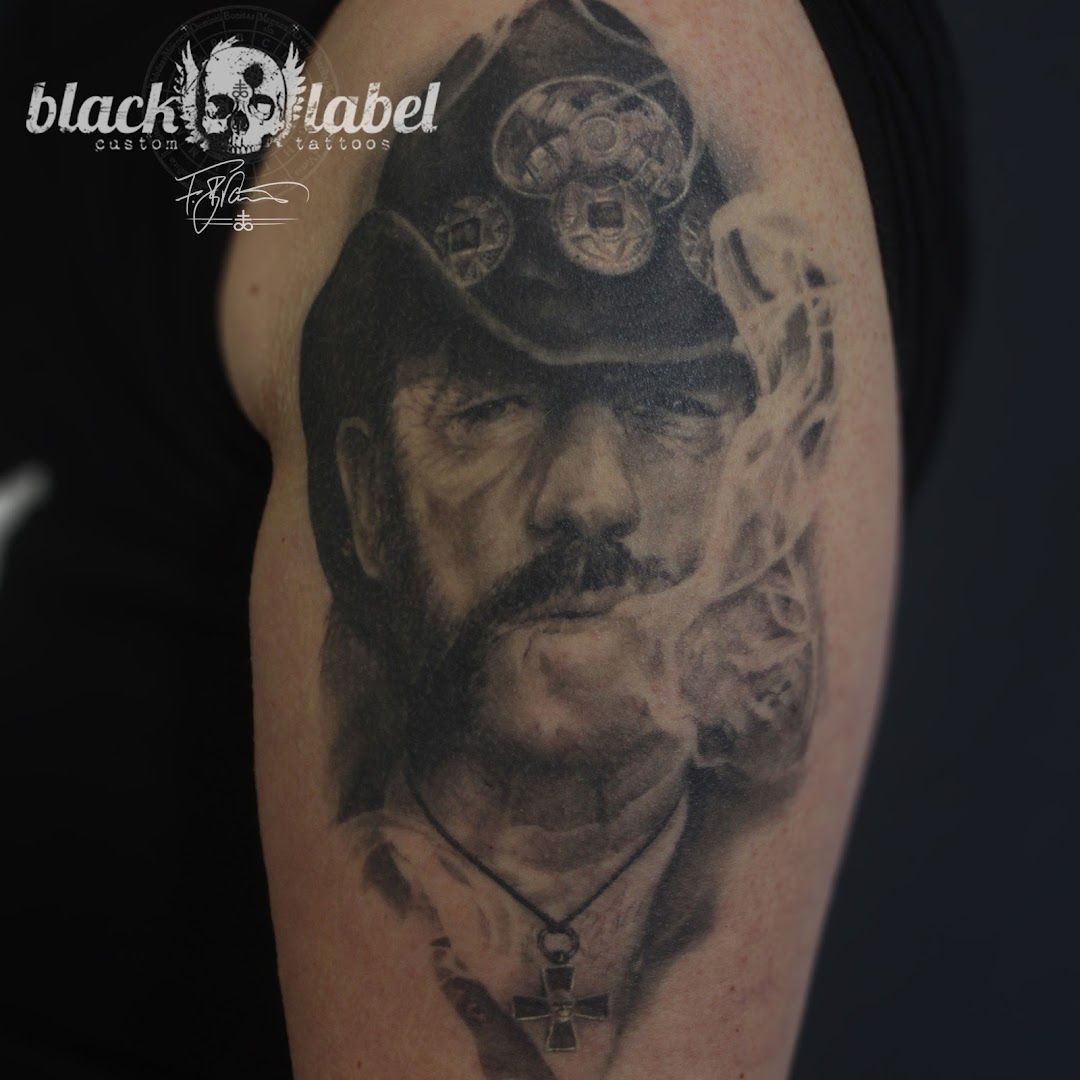 a man with a hat and a clock cover-up tattoo on his arm, ennepe-ruhr-kreis, germany