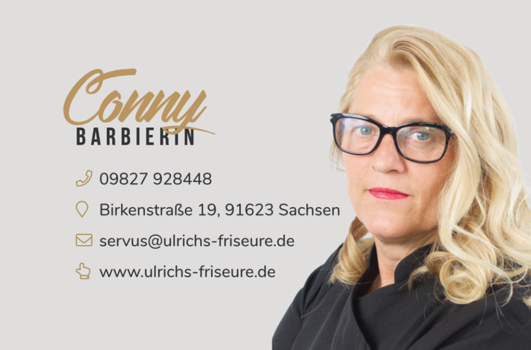 a woman wearing glasses and a black jacket