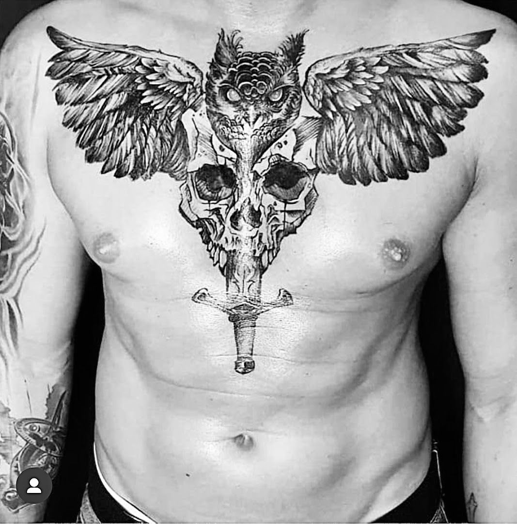 a man with a narben tattoo on his chest, berlin, germany