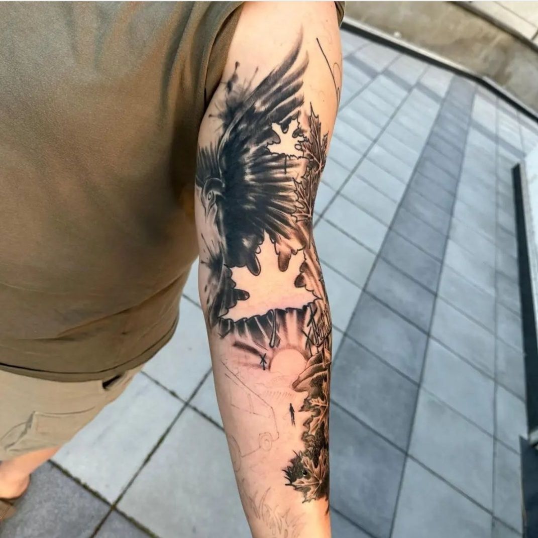 a man with a cover-up tattoo on his arm, alzey-worms, germany