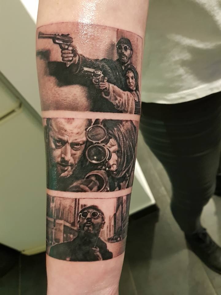 a cover-up tattoo of a man with a gun and a woman holding a gun, hamburg, germany