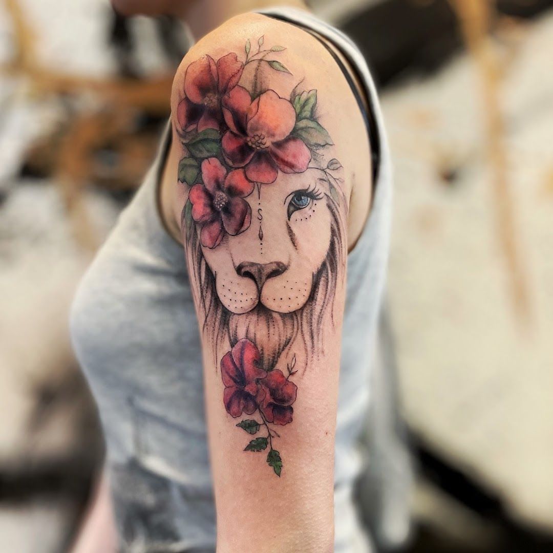 a lion with flowers on his head