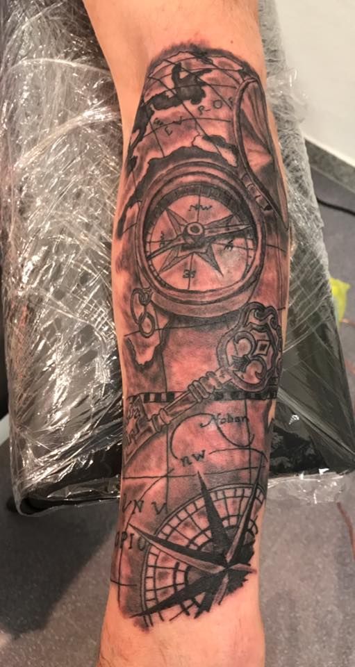 a cover-up tattoo of a clock and a compass, mönchengladbach, germany