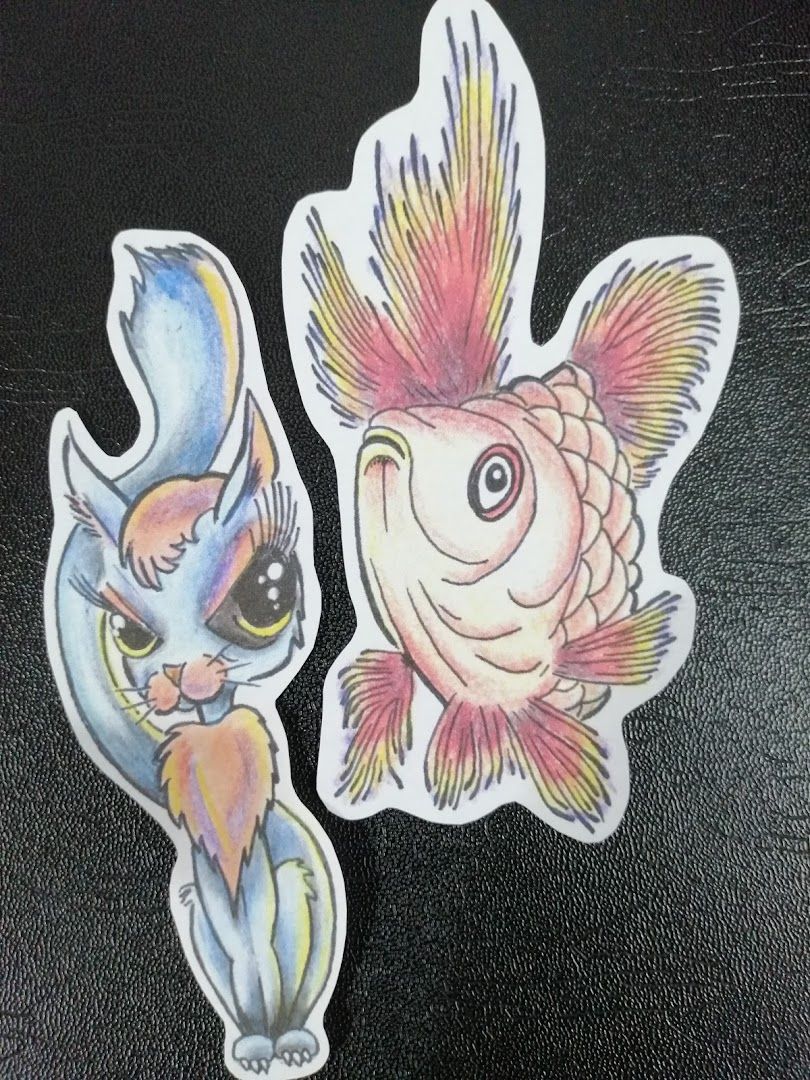 two stickers of a fish and a fish