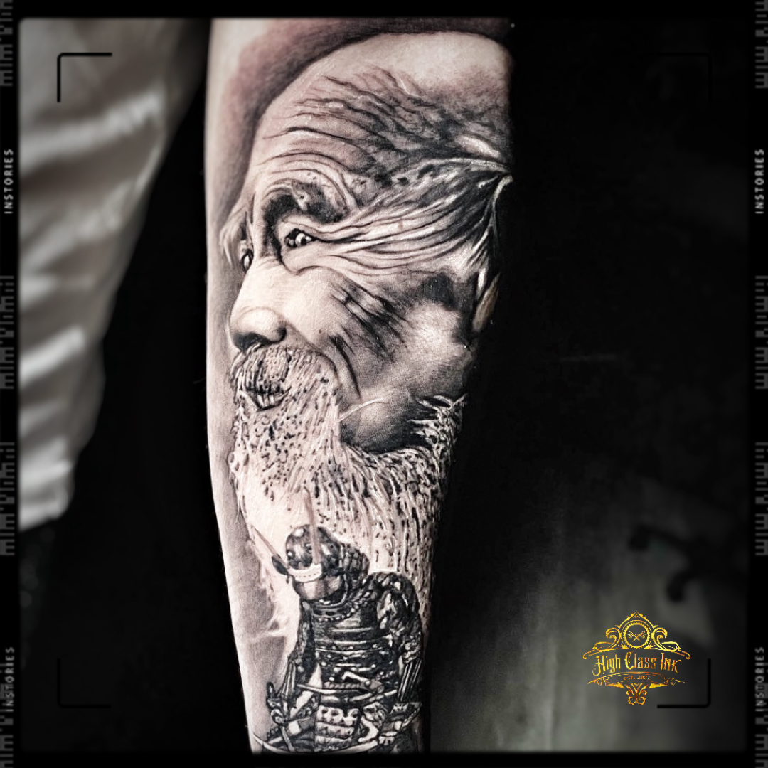 a man with a beard and a beard portrait tattoos on his arm, wesel, germany