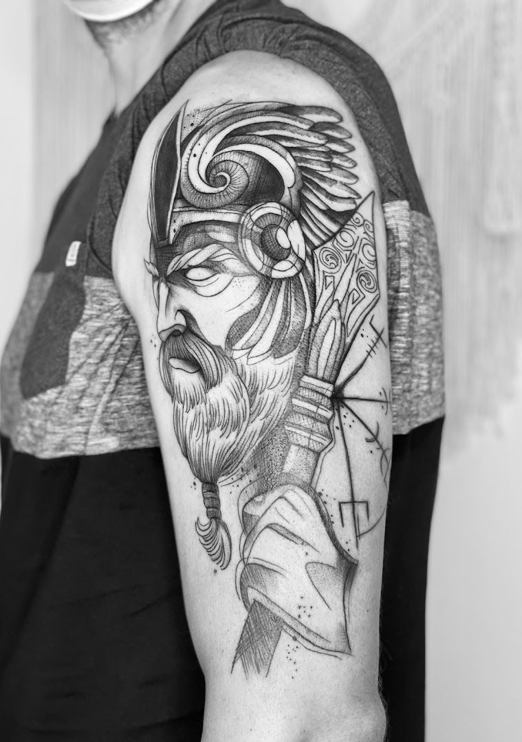 a man with a japanische tattoos in leipzig on his arm, saarlouis, germany