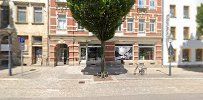 a street with a tree in the middle