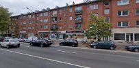 the street in front of the apartment building