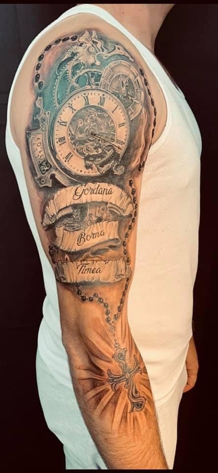 a man with a clock cover-up tattoo on his arm, rheinisch-bergischer kreis, germany