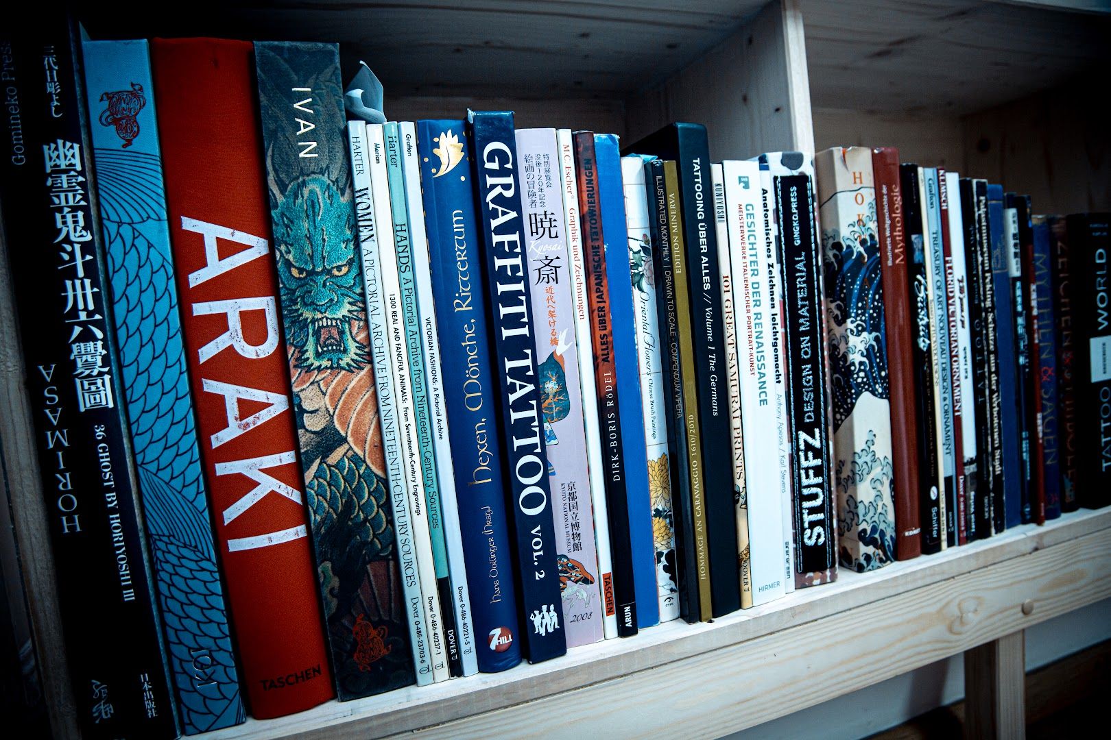 a book shelf with a bunch of books on it