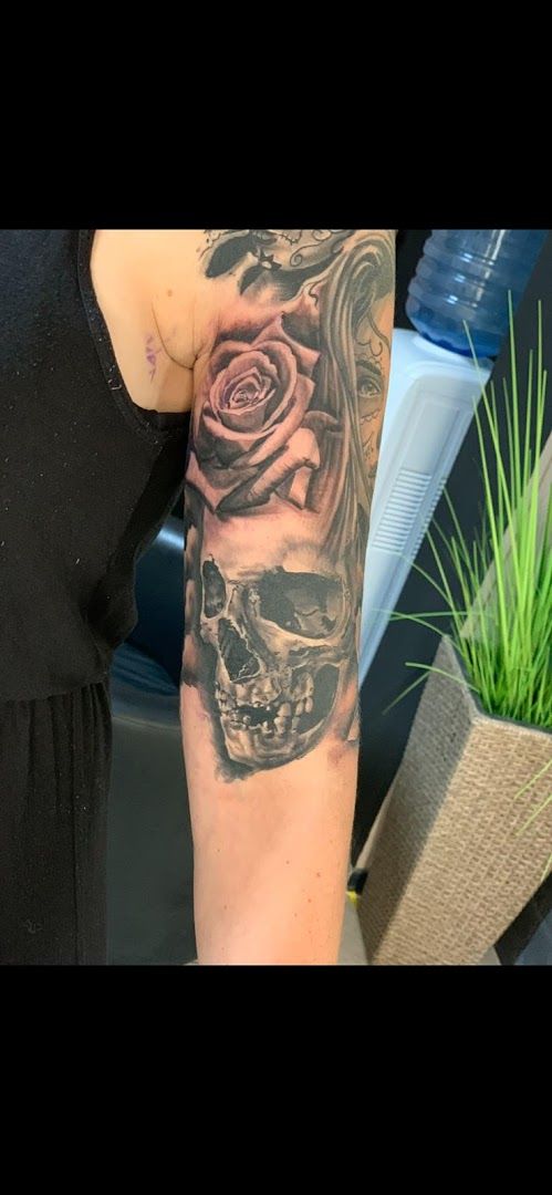 a woman with a japanische tattoos in leipzig on her arm, forchheim, germany