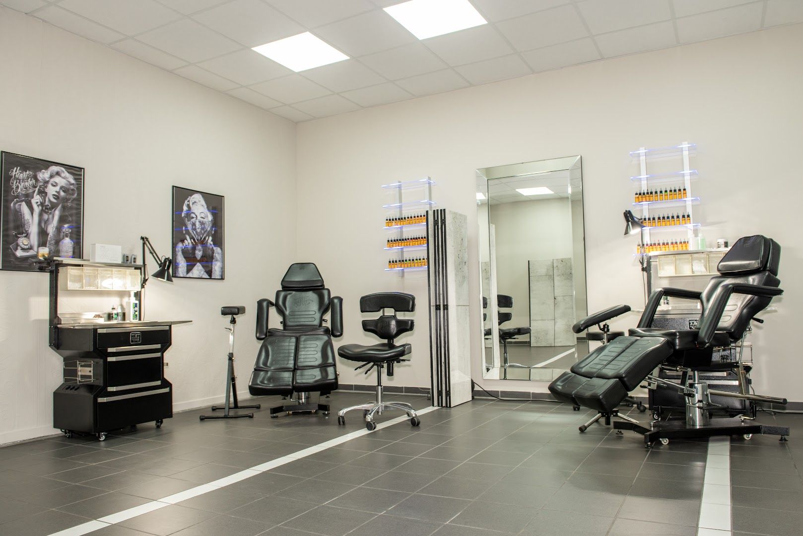 a salon with a chair and a mirror