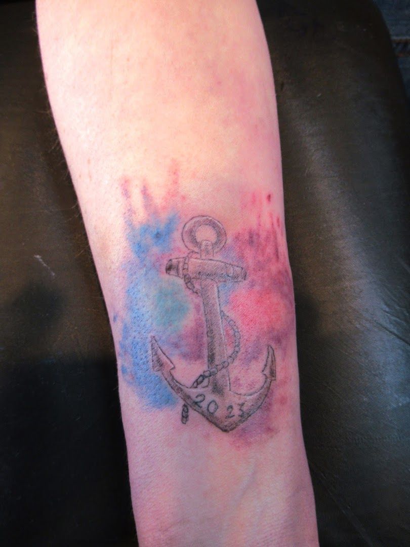 a narben tattoo with an anchor on the arm, ammerland, germany