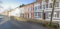 a street with houses and cars on it